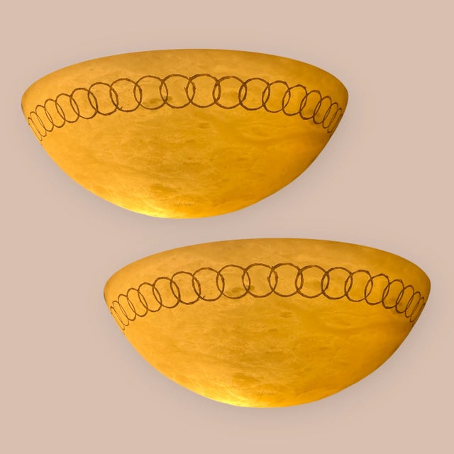 Marbled glass sconces set of 2 1980s. golden color marbled glass with a circular decor. width 40 cm height 25 cm depth 20...