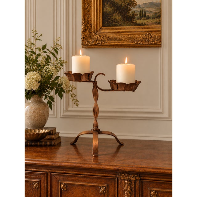 An unusual antique Arts & Crafts copper double pricket candlestick, dating to the early 20th century, circa 1900–1930....