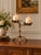 An unusual antique Arts & Crafts copper double pricket candlestick, dating to the early 20th century, circa 1900–1930....