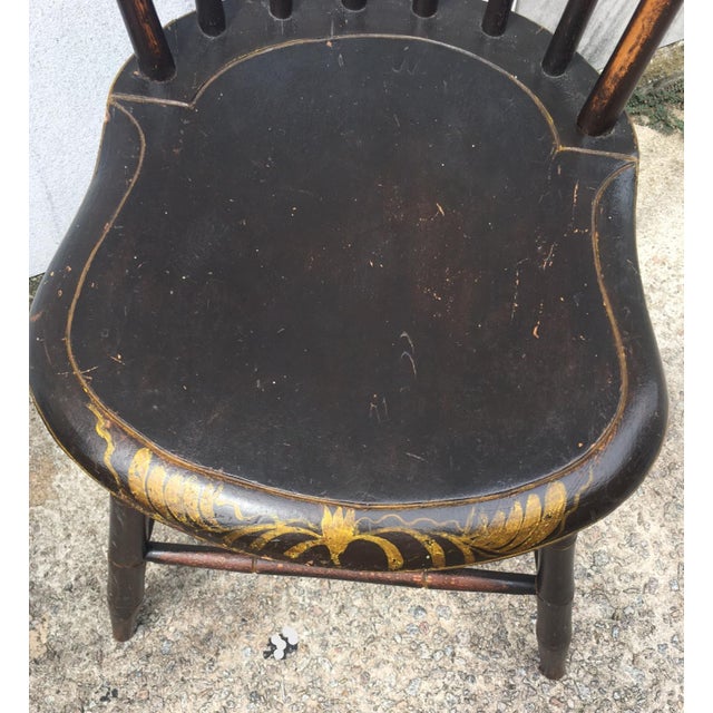 This is a handsome mixed marriage of two similar sets of early New England spindle backed Hitchcock chairs, and are made...