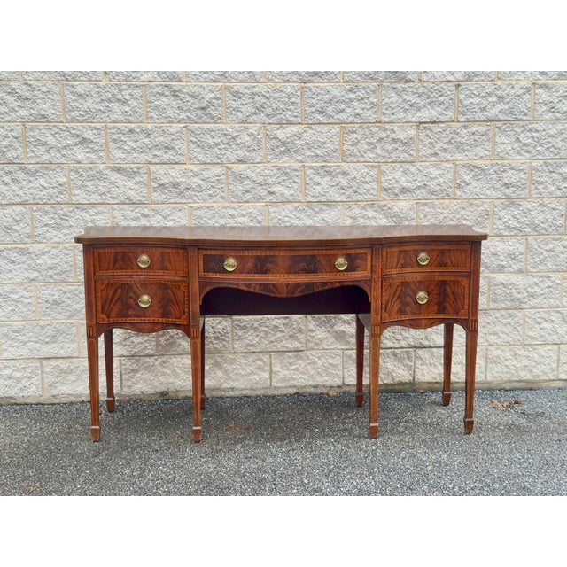 Vintage mahogany inlaid tapered leg buffet with original finish and gorgeous brass details, dovetail construction.