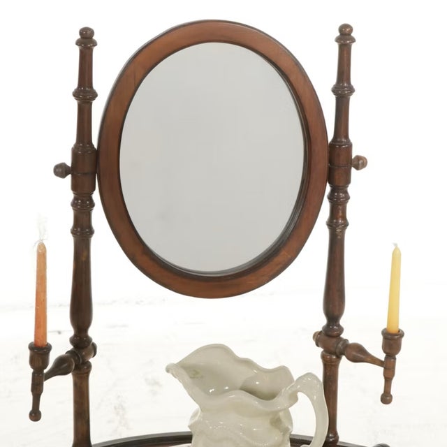 This Late 19th-century Victorian washstand showcases magnificent hand-carved details and architectural depth. The solid...
