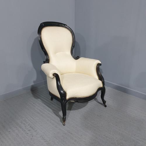 This is a wonderful mid 19th Century French antique ebonised armchair, upholstered in cream linen, in overall excellent...