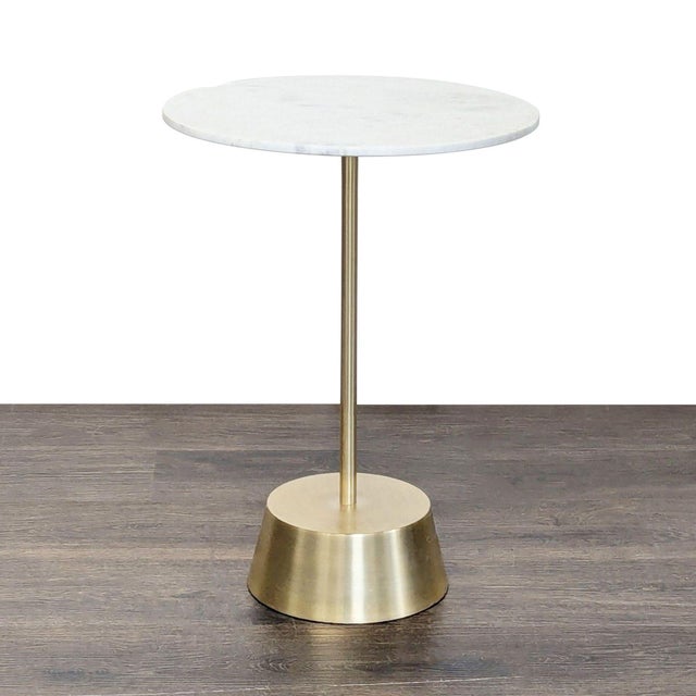 Marble top on a sculptural metal base in an antique brass finish. Brand: West Elm. Original Price: $172. Dimensions (in):...