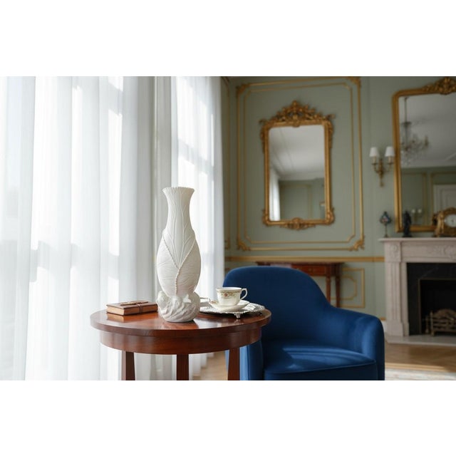 Bring timeless Chinoiserie charm into your home with this vintage Chinese fine bone porcelain vase, featuring an exquisite...