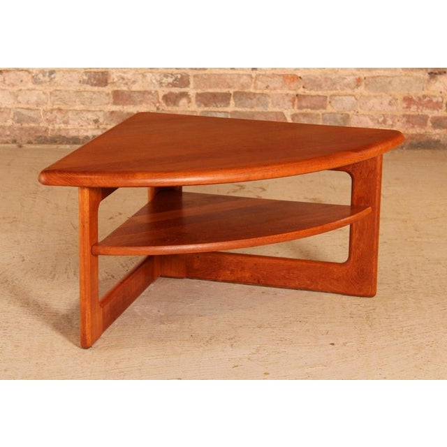 Danish mid century solid teak corner / coffee table with a magazine shelf by s. Burchardt-nielsen, circa 1970s. Excellent...