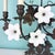 Vintage 7 Light Wrought Iron Wall Sconce With Milk Glass Flowers & Cherub Motif Matching Sconce Available Separately For Sale - Image 4 of 12