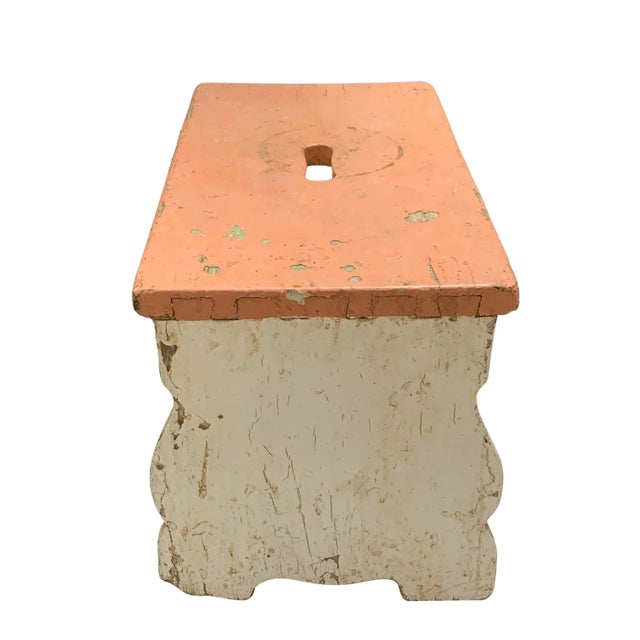Handcrafted in Hungary, this wooden stool was widely used around farmhouses. Repurpose it as the perfect decorative piece...