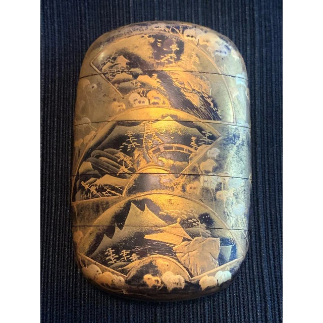 A four-case lacquered Japanese inro by Yutokusai (Gyokkei), a lacquer artist active from nd of Edo to Meiji period). The...