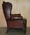 Vintage Chesterfield Wingback Armchairs and Footstools in Oxblood Leather, Set of 4 For Sale - Image 11 of 18