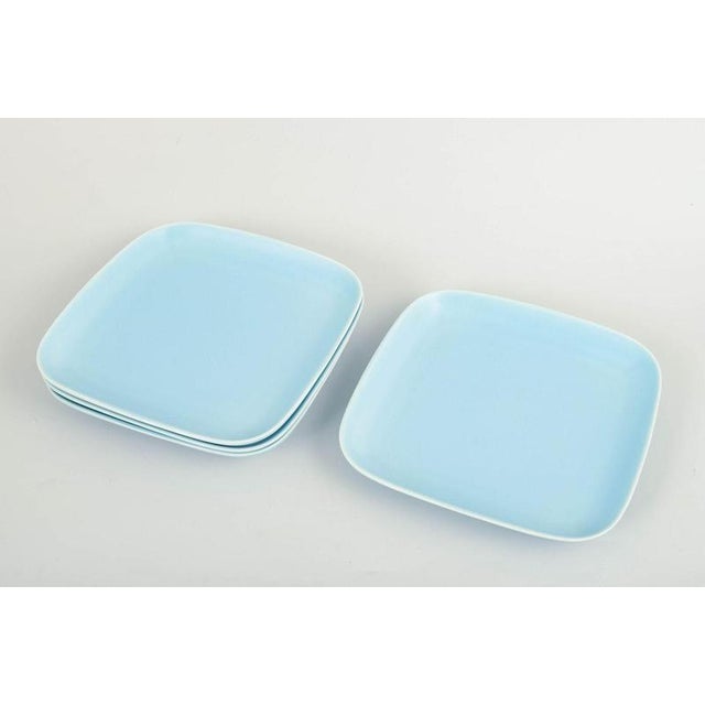 Höganäs Keramik, set of four dinner plates in turquoise glaze. Square dinner plates in stoneware with rounded corners and...