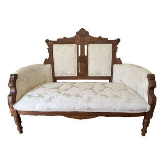 Antique Victorian Eastlake Walnut Settee/Loveseat - Reupholstered For Sale