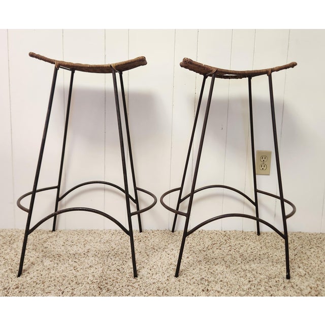 classically mid century modern, pair of barstools attributed to designer Arthur Umanoff, made by Raymor in the 1950s,...