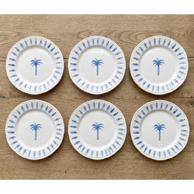 This charming set of six handcrafted ceramic dinner plates by Les-Ottomans brings a sophisticated, tropical elegance to...