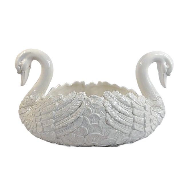 This is a beautiful vintage Italian ceramic planter in a double swan form. Two arched swans frame a central bowl, with...