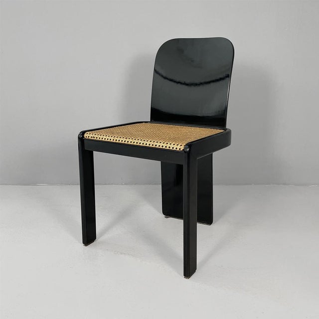 Italian modern chairs by Pierluigi Molinari for Pozzi, 1970s Set of four black-painted bentwood chairs with Vienna straw...