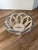 Vintage round stoneware or ceramic woven lattice basket bowl with a cream-colored body, blue-accented open-weave tubular...