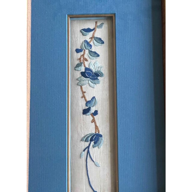 A set of three antique textile fragments from China, circa 19th century Qing dynasty, professionally displayed in matching...