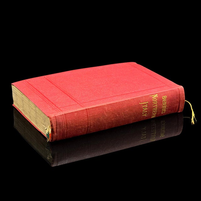 This is an antique copy of Baedeker’s Northern Italy, a bound and illustrated travel guide book, presented in its intact,...