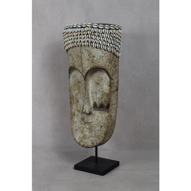 Well known for their reliquary figures the Fang also danced finely sculpted masks during a number of ritual activities....