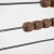 A wooden abacus created in 20th century France. A symbol of antiquated mathematical processes, this seemingly simple stack...