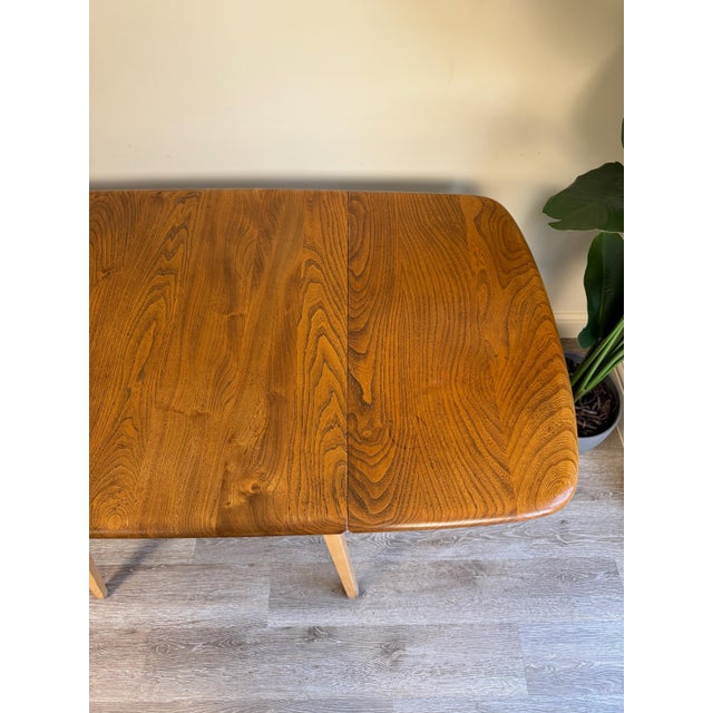Brown Rectangular Drop Leaf Extending Dining Table in Elm from Ercol, 1950s For Sale - Image 8 of 15