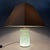 A lighting fixture of exceptional rarity and refined value. This exquisite table lamp, model "joe" by g luce, is an...