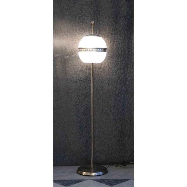 Chiaravallotti floor lamp is an elegant design lamp designed in the half of the 1950s. Steel and glass. Created by...