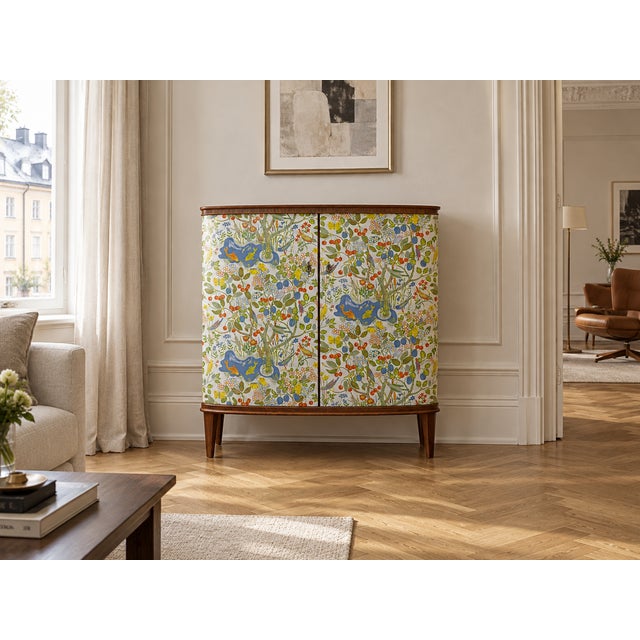Swedish Modern with a Playful Soul A beautiful vintage cabinet, professionally refinished and decorated with a vibrant...