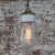 Mid-Century Industrial White Porcelain, Clear Glass, and Brass Pendant Lamp For Sale - Image 4 of 5