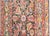 A wonderful early 20th century Persian Kurdish rug with an all-over floral trellis pattern with large flowers and leaves...