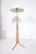 Height-adjustable floor lamp ,by Eric Elfwén, made of brass and beech. Signed and Labeled. Height 100 cm.- 140 cm Diameter...