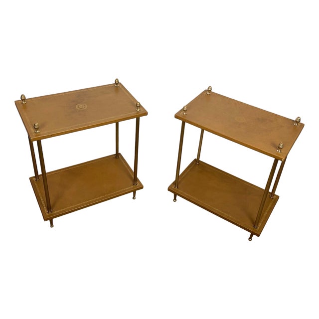 1940s Pair of neoclassical style brass side tables with tan leather tops Attributed to Maison Jansen For Sale