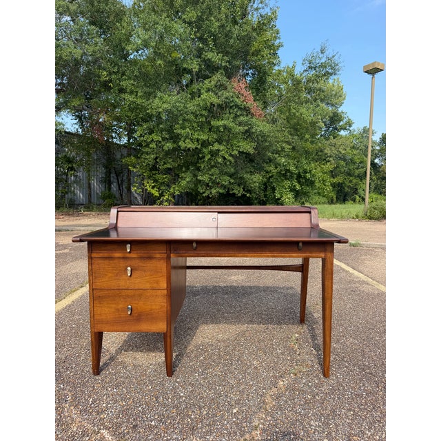 A true mid-century modern showstopper. This exceptional Drexel Profile executive desk, designed by John Van Koert, has...