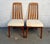 This exquisite pair of Danish modern style dining chairs, featuring a design often associated with mid-20th century...