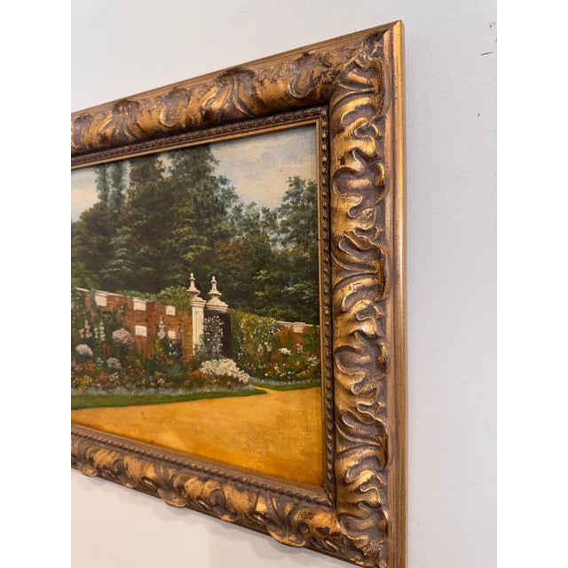 Framed Early 20th Century Oil - "The Wall Borders" This early 20th-century painting captures the tranquil beauty of a...