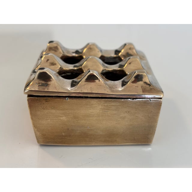 Vintage Ultima 15 Ashtray in Brass by Holger Bäckström and Bo Ljungberg, 1970s, in Very Good conditions. Designed 1970 to...