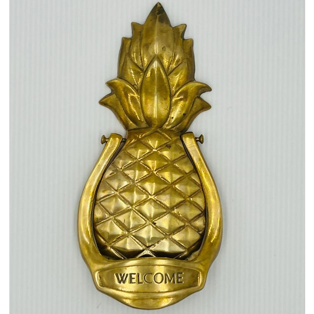 Swing on over! Nothing tops hospitality like a classic brass pineapple door knocker. Solid brass.