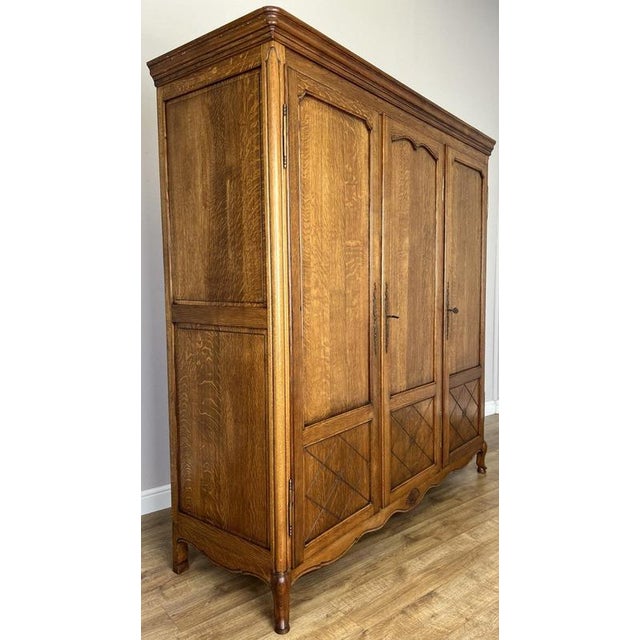 Vintage Louis XVI French Three Door Oak Carved Armoire For Sale - Image 3 of 13