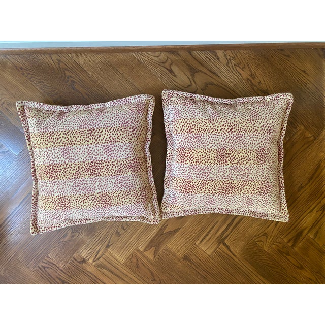 Pair of 20" decorative pillows in Cowtan & Tout's "Malabar" in red. Pillow covers with flange and no zipper. Pillows...