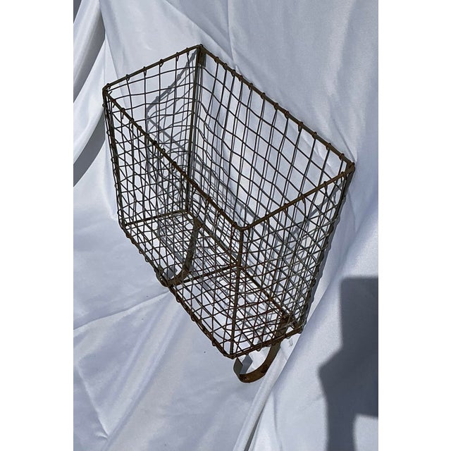 Early 1900's Large, Rustic French hanging, crimped wire, wall basket, with 2 two metal hooks on the bottom. Great for...