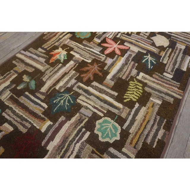 Lofty Brown Color Background With Floral and Symmetrical Patters Design Vintage American Hooked Rug For Sale - Image 10 of 13