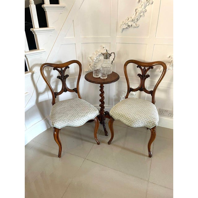 Pair of antique Victorian quality carved walnut side chairs having fantastic quality carved solid walnut shaped backs,...
