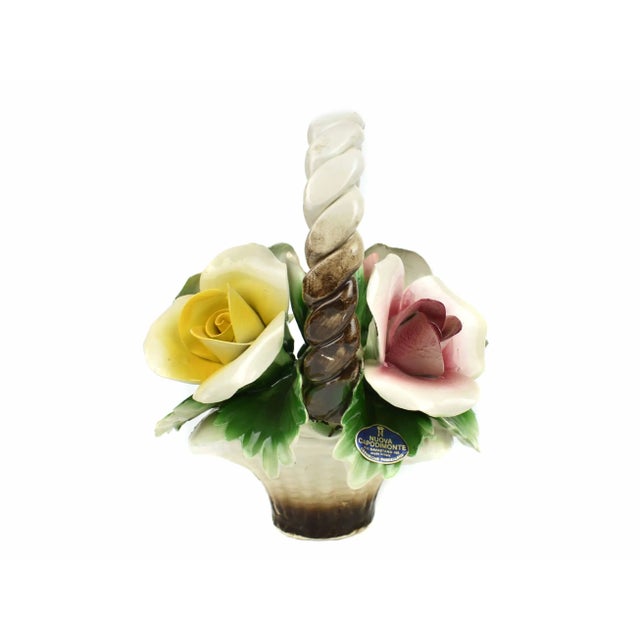 Stunning handmade Italian Nuona Capodimonte porcelain flower basket centerpiece. It is a great piece for any home setting...