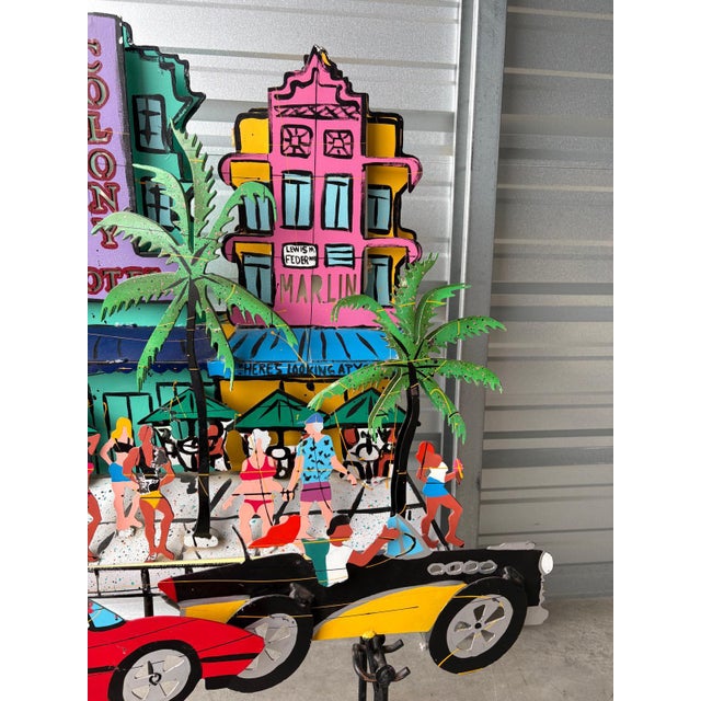 A vibrant and lively mixed-media kinetic sculpture signed Prescott and dated 1997, capturing the unmistakable energy of...
