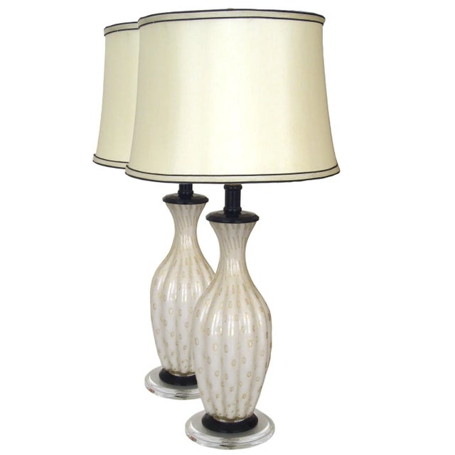 These Vintage Pair of Vintage Barovier Toso Table Lamps from Mid-Century are elegantly rebuilt. The lamp is remounted on a...