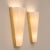 Elegant pair of Italian wall sconces from the 1970s, crafted in plexiglass, metal and brass in the refined style of...