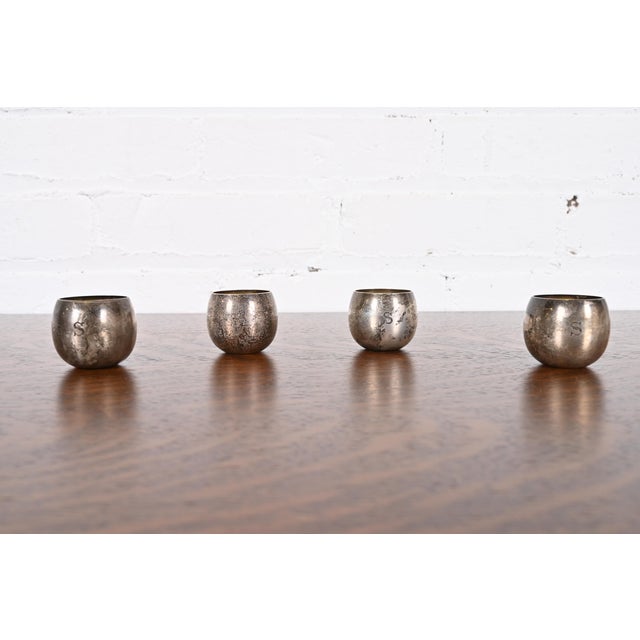 A gorgeous antique set of four monogrammed sterling silver small cups or cordials By Tiffany & Co. (signed to the...