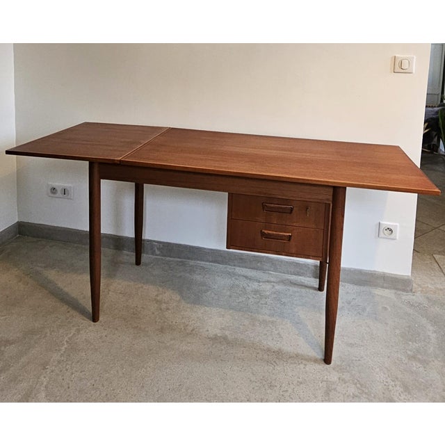 Elegant Scandinavian desk designed and manufactured by Tibergaard in Denmark around 1960. Made of teak, with clean,...
