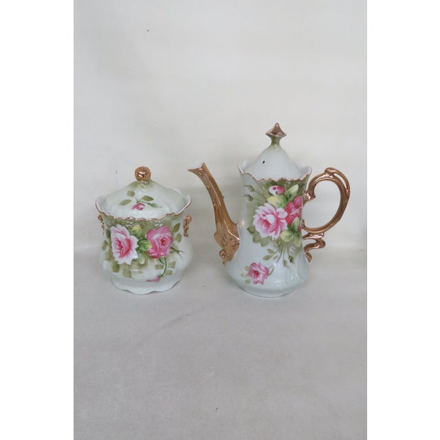This gorgeous Tea/Coffee Set is made out of porcelain. This wonderful set is stamped as being made by Letson and the...